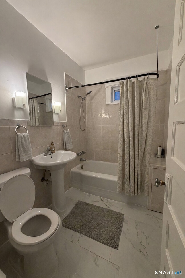 Building Photo - 93-95-95 Alpine St