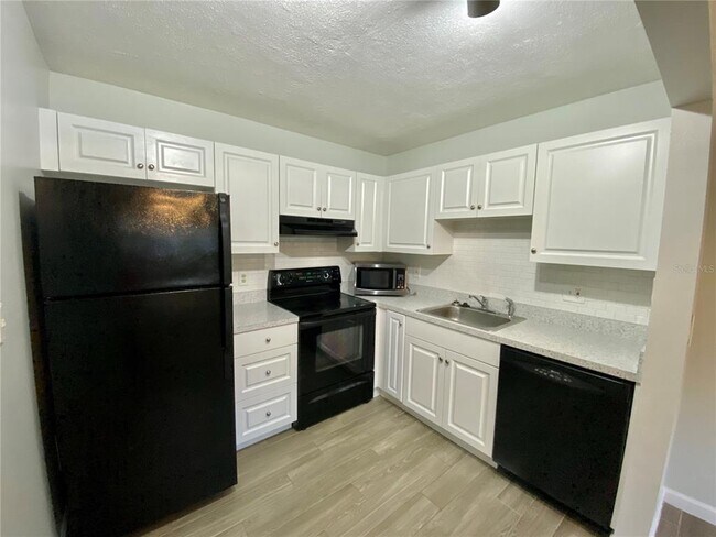 Building Photo - 11716 Raintree Village Blvd