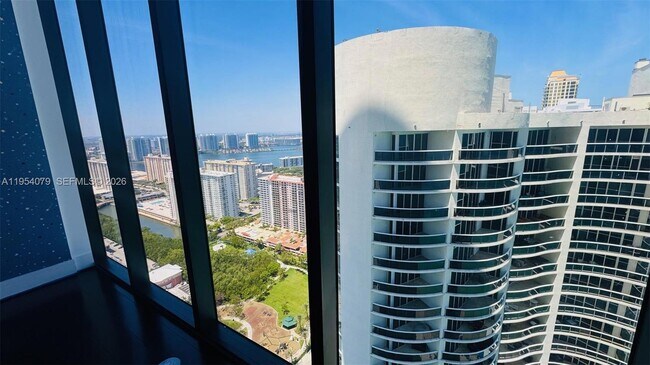 Building Photo - 17141 Collins Ave