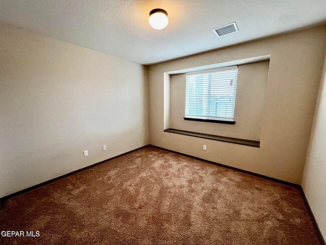 Building Photo - 12777 Tre Maximiliano Ave