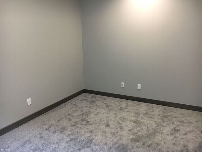 Building Photo - Spacious 4 bedroom/3 bath home with finished lower level and attached 2 car garage