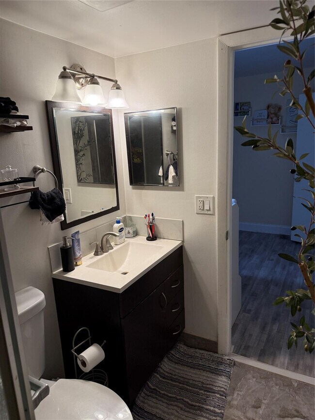 Building Photo - 7355 Woodmont Terrace