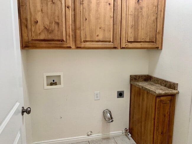 Building Photo - Pet-Friendly Four Bedroom Home with RV par...