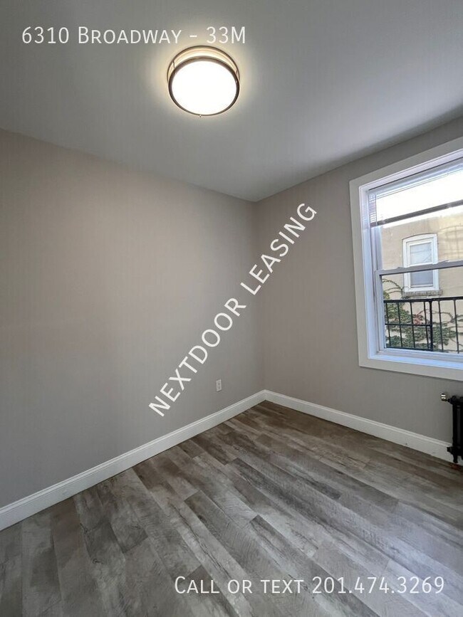 Building Photo - 6310 Broadway-33M