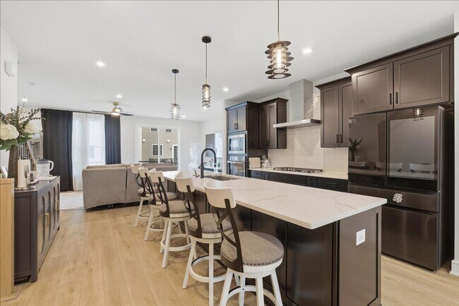 Building Photo - Welcome to this stunning, newly built 2025 townhome nestled in the heart of Brambleton