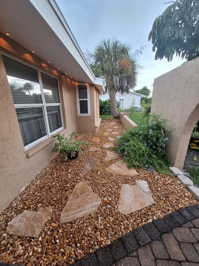 Building Photo - Gulf Access Home on Canal Available Now