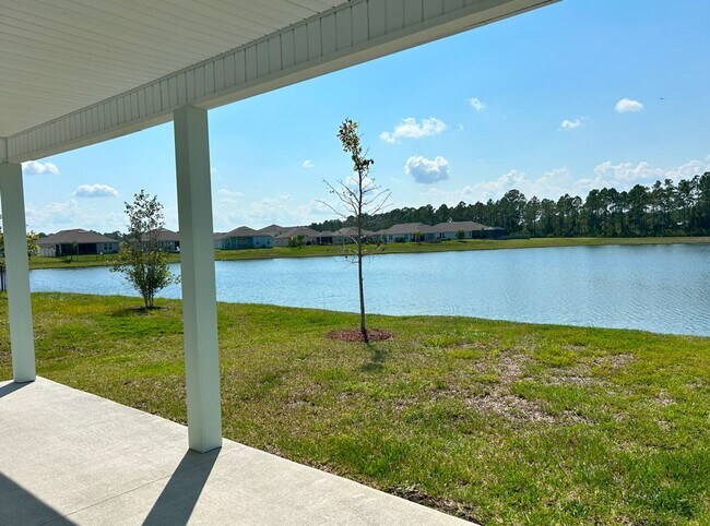 Building Photo - PREMIUM FINISHES AND POND VIEW!!  A PREMIU...