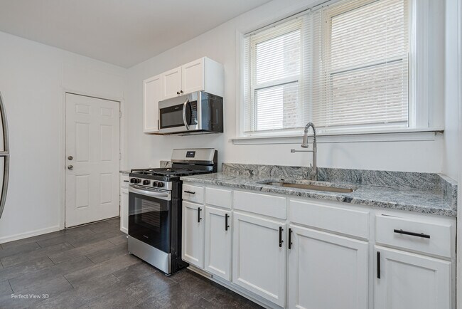 Building Photo - 7332 S Artesian Ave