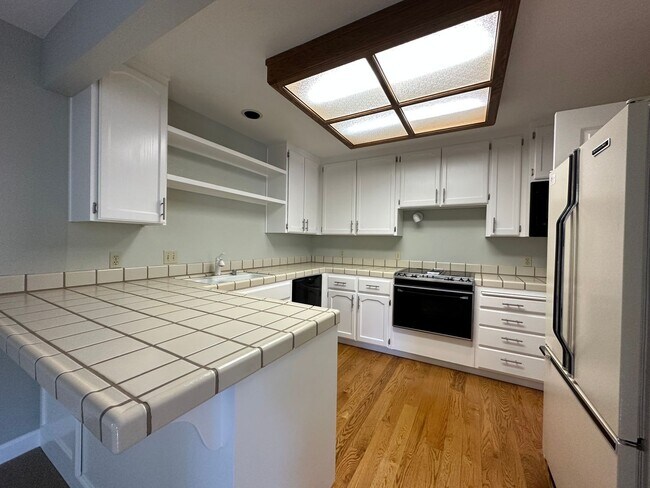 Building Photo - Chic Campbell End Unit Townhouse with 2 Bedrooms, Loft & 2.5 Baths