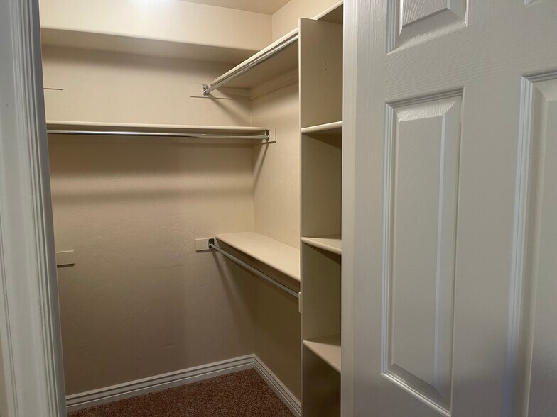 Walk-in Closet master suite - 143 E Box Elder Dr