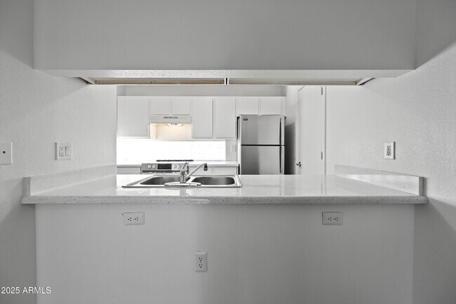 Building Photo - 3065 N 67th Ave
