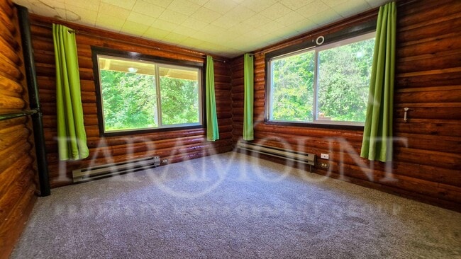 Building Photo - Spacious Log Home with Acreage!