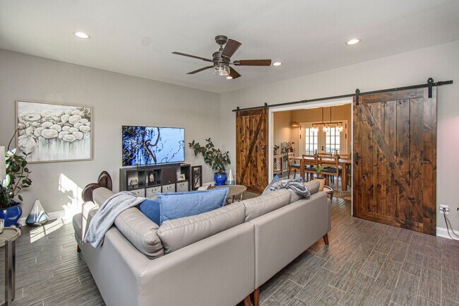 Building Photo - Spacious Home with Hot Tub, Fenced Yard an...