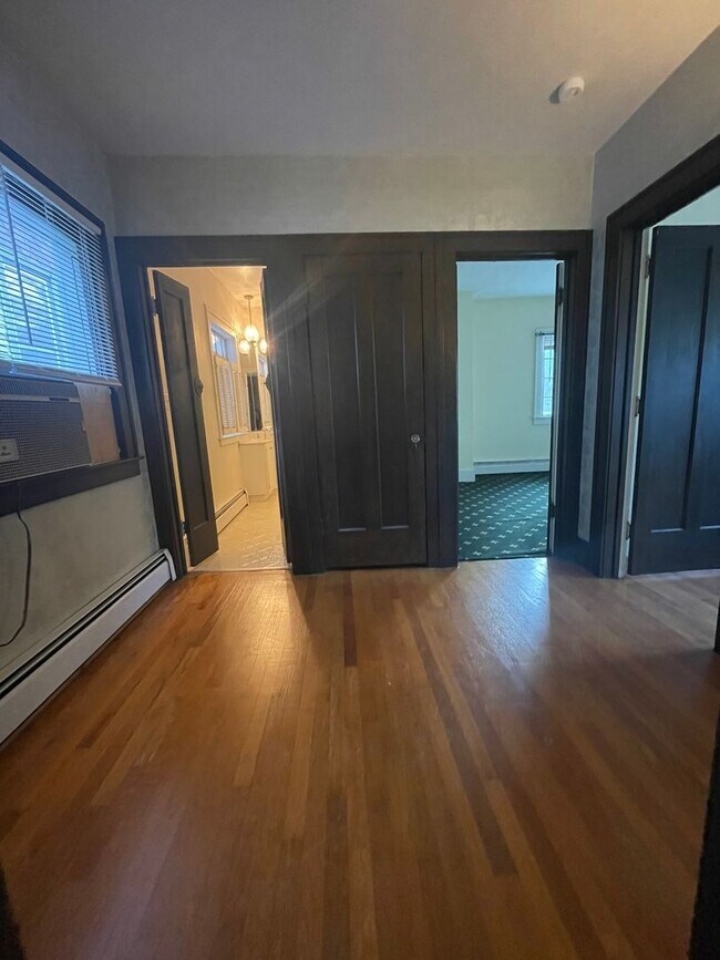 Building Photo - One Block to the Diag! Charming Home with Private Courtyard + Parking