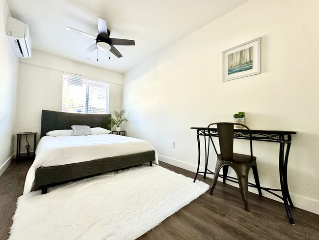 Queen Bed and Small Computer Desk. - 3916 E 2nd St