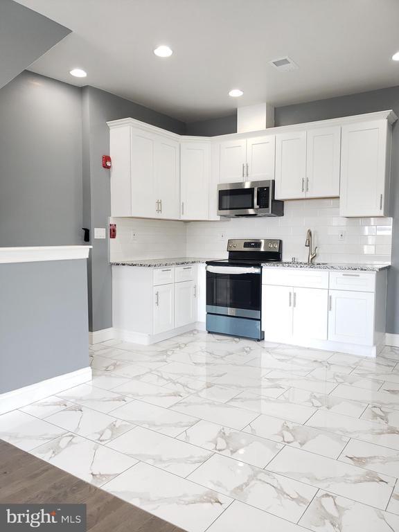 Building Photo - 5109 Woodland Ave