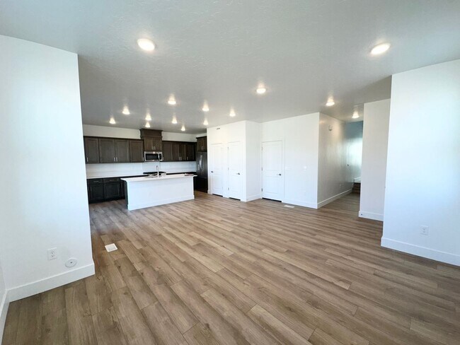 Building Photo - Spacious Luxury Townhome Designed for Modern Living