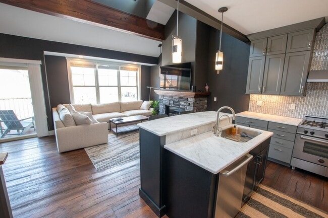 Building Photo - Experience Elevated Living with West Bay V...