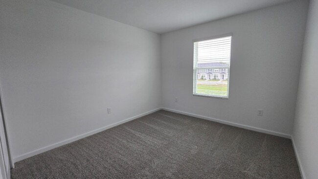 Building Photo - Brand-New Apopka 4Bed/2.5 Bath Townhome Avail for Rent! Be The first to Live Here!