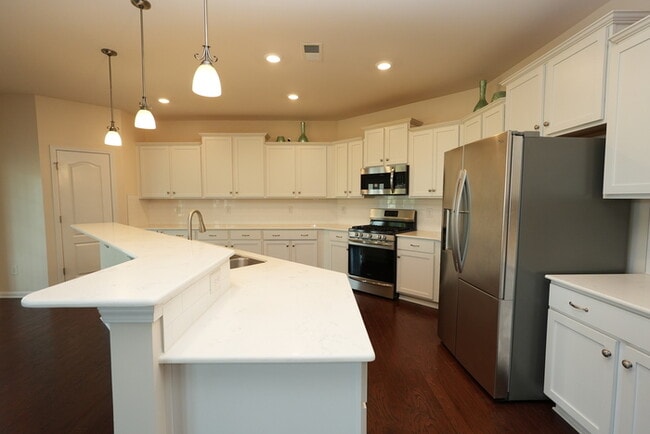 Building Photo - Modern 4BR 3.5BA w/ Updated Kitchen + Screened Porch + Wraparound Island in Bryton