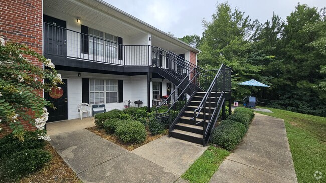 spacious patios with storage units - Evangeline Heights Apartments