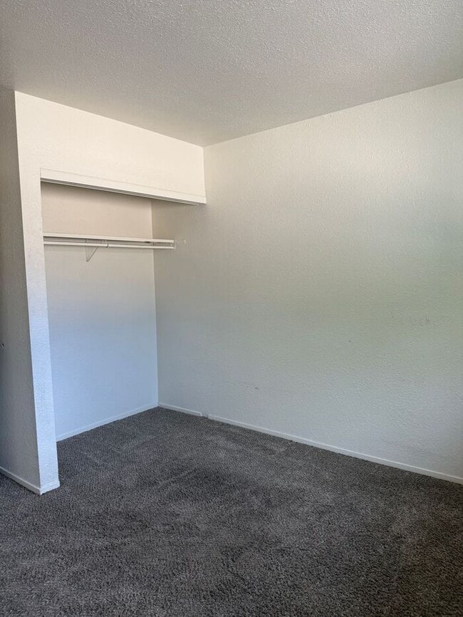 Building Photo - 2-Bedroom Townhouse Near Shopping, Dining & Freeway Access