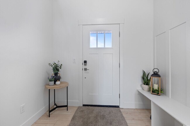 Building Photo - New St. Anthony Townhome with Unfinished Basement & Private Patio