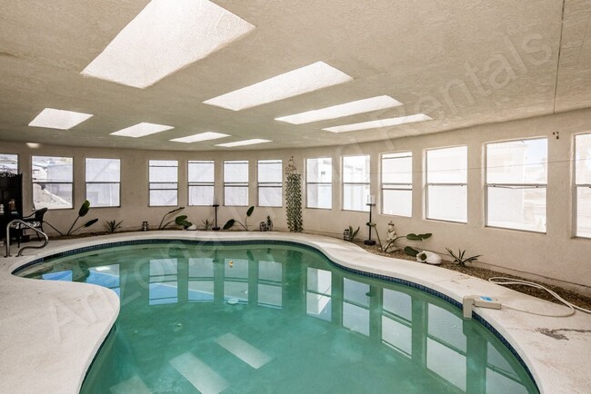 Building Photo - FURNISHED WITH INDOOR POOL