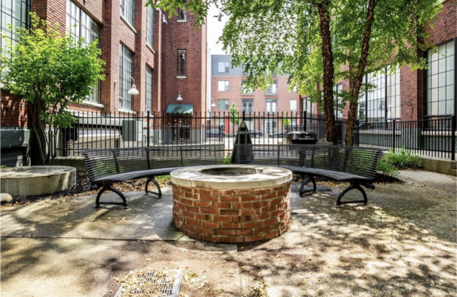 Property Courtyard and Fireplace - 630 N College Ave