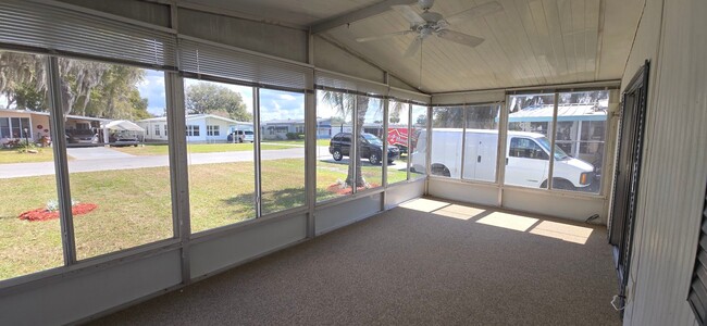 Building Photo - 2 bed 2 baths with carport