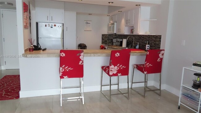 Building Photo - 5701 Collins Ave