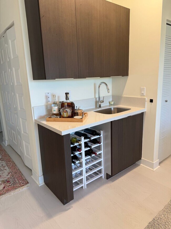 Building Photo - Premium Lake-View URBANA Residence Steps from Downtown Doral