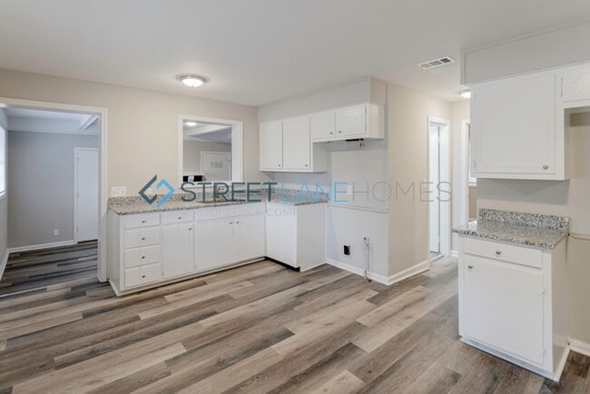 Building Photo - NOW OFFERING HALF OFF THE FIRST FULL MONTH...