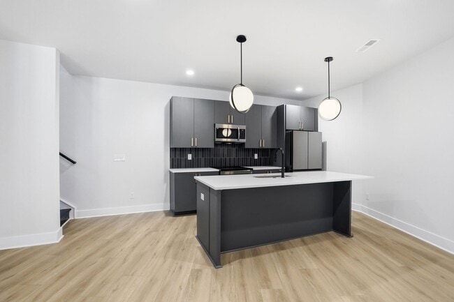 Building Photo - Bright, Open & Exceptionally Large—Your Ideal 2-Story Townhome