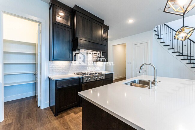 Building Photo - Highly Upgraded Five-Bedroom Home Located ...