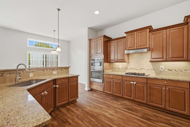 Building Photo - Sophisticated Colonial Offering Refined Finishes, Gourmet Kitchen & Spacious Floor Plan