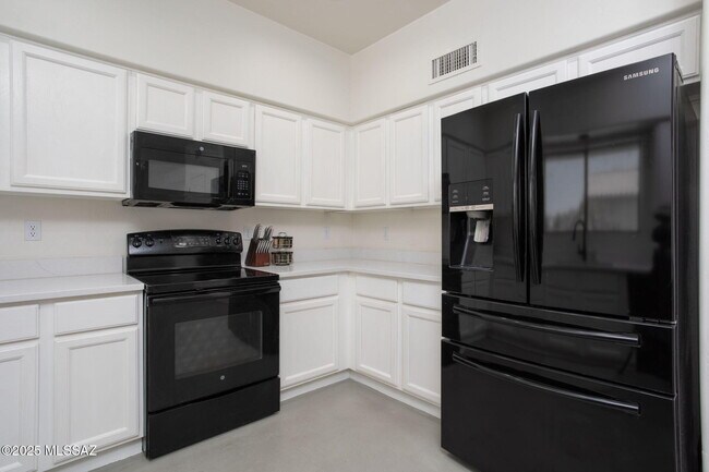 Building Photo - 6851 W Kern Dr