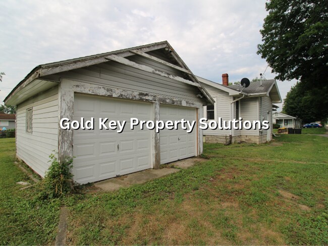Building Photo - Attractive 2 BR 1 BA House with 2-Car Garage and Covered Porch (NO SECTION 8)