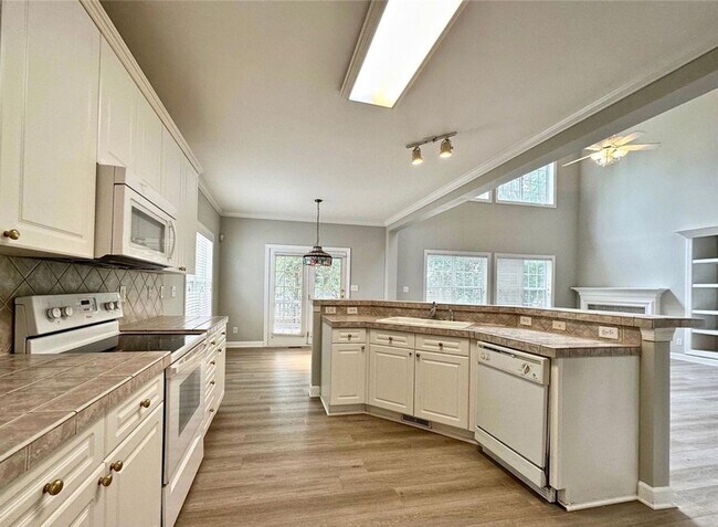 Building Photo - 4 BR/2.5BA | Newly Renovated Single Family Home |Fenced backyard| Elegant Brick Home in the Heart...