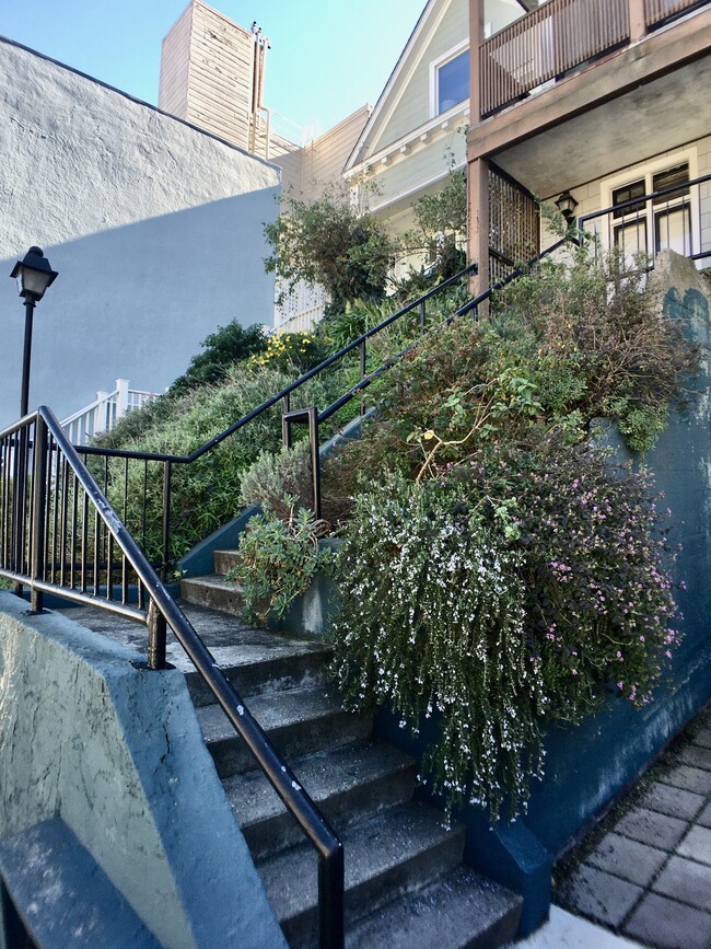 Upper stairway to apartments - 181 Liberty St