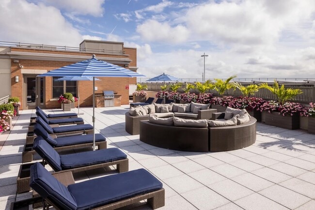Lounge in the sun on our rooftop terrace in Morristown, NJ. - The Metropolitan at 40 Park