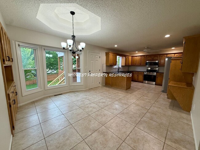 Building Photo - Spacious 3 Bedroom Home with Finished Basement, Covered Deck & Fenced Yard