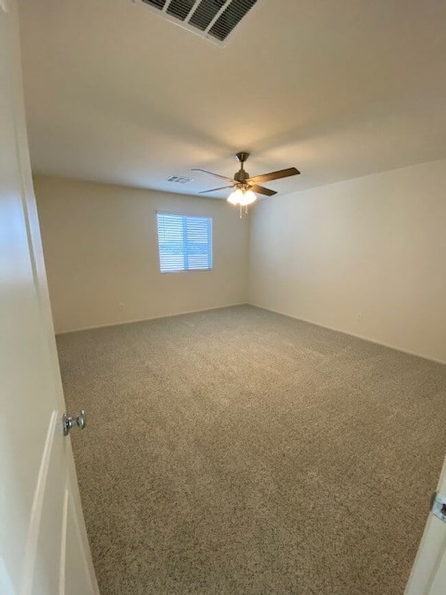 Building Photo - Beautiful Townhome in a Gated Community with 2-Car Garage!!