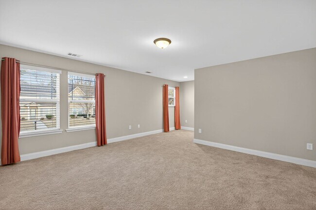 Building Photo - Move-In Ready Gem with Main-Level Owner's Suite