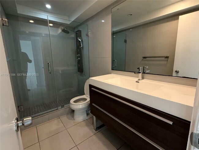 Building Photo - 5005 Collins Ave