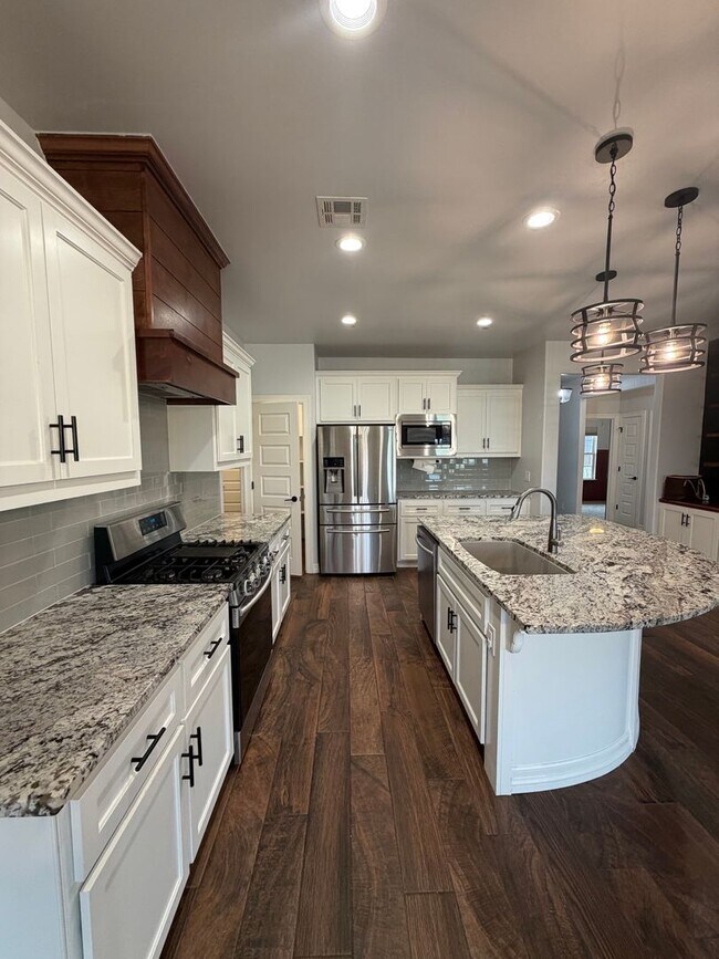 Building Photo - Community Pool - Lawn Care Included - Storm Shelter - Community Pool