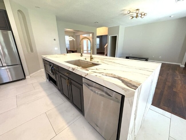 Building Photo - Available NOW!  Stunning 5-Bedroom Home in Gated Avalon Lakes Community