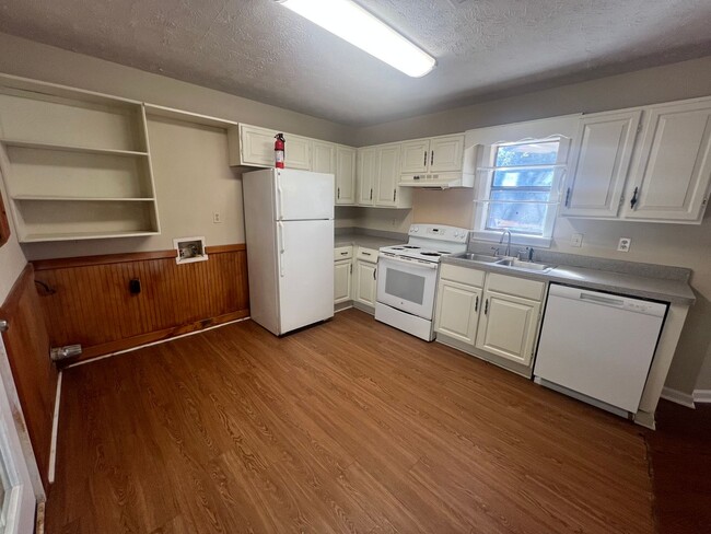 Building Photo - HALF OFF YOUR FIRST MONTH'S RENT!