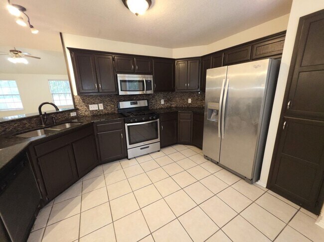 Building Photo - 1600 Hollow Tree Blvd