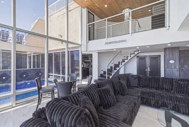 Building Photo - Luxury Penthouse Retreat with Private Pool, Sauna & Strip Views